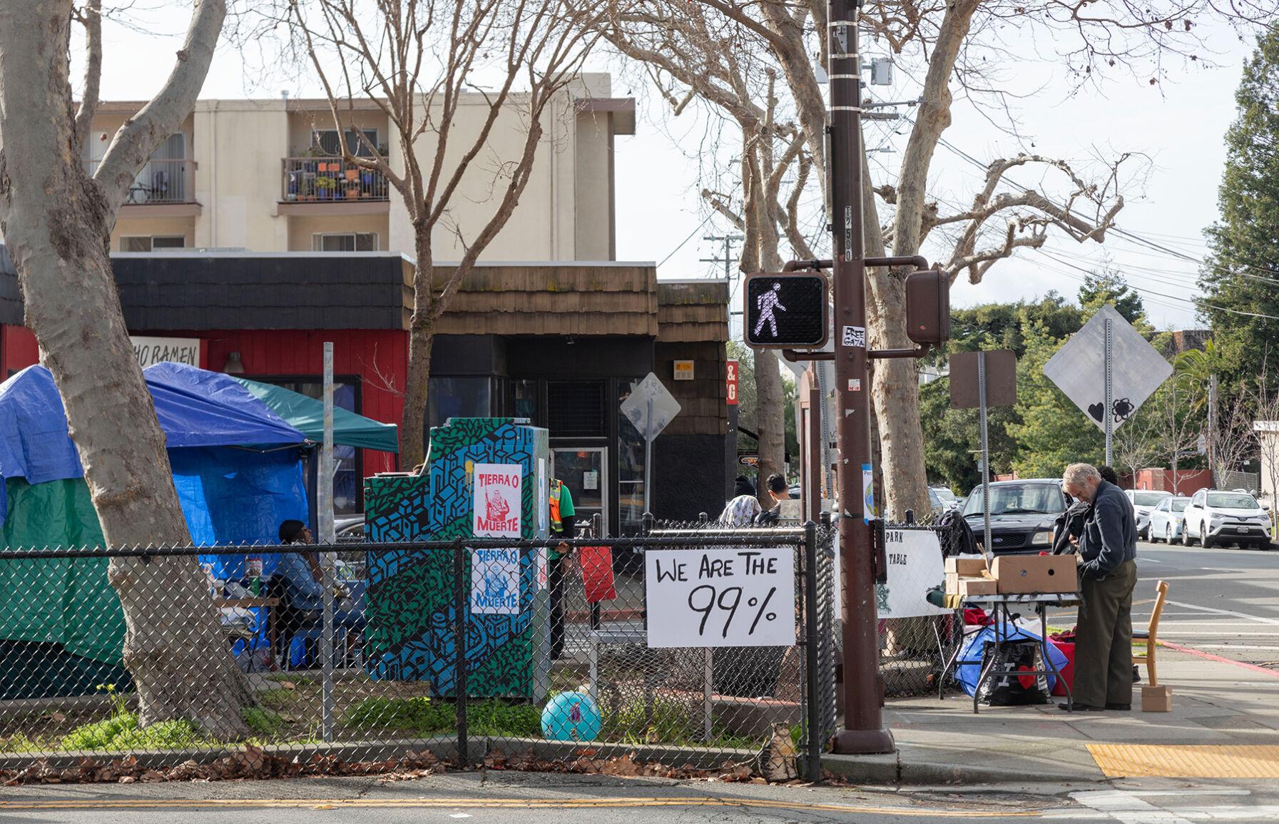 Image of the "People's Free Store." A sign says "We are the 99%". Photo by Maxine Eschger | The Daily Californian