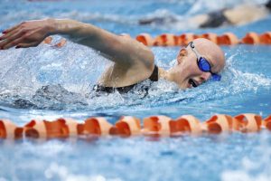Hayes glides through the water against Virginia Tech Jan. 11. Courtesy Virginia Athletics